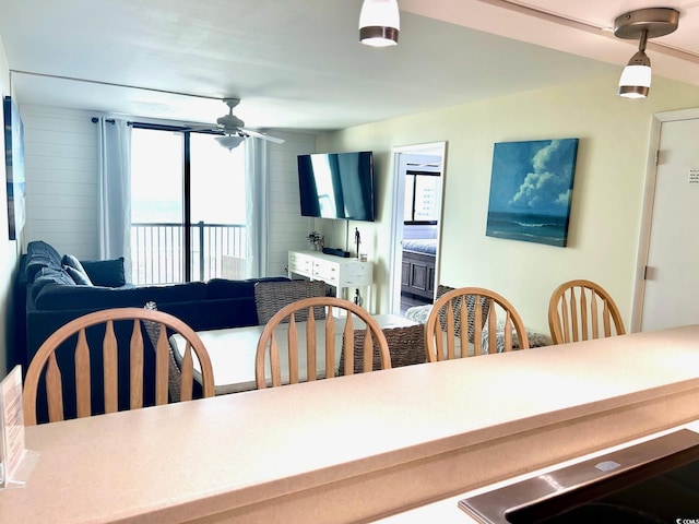 dining area with a ceiling fan