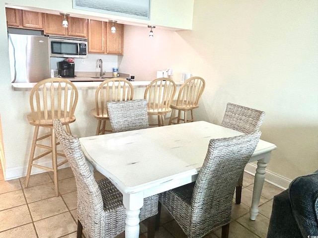 dining area with baseboards