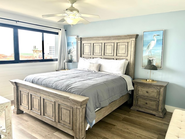 bedroom with light wood-style floors and ceiling fan