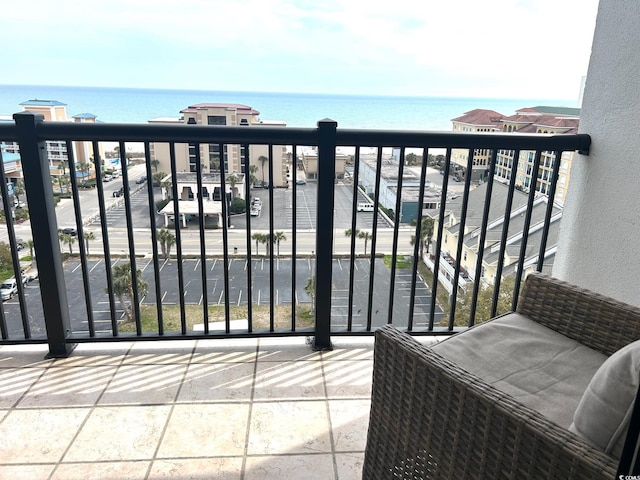 balcony featuring a water view