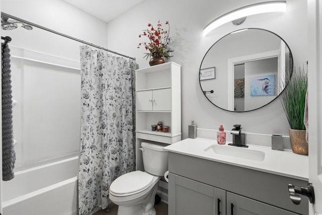 bathroom featuring toilet, vanity, and shower / bathtub combination with curtain