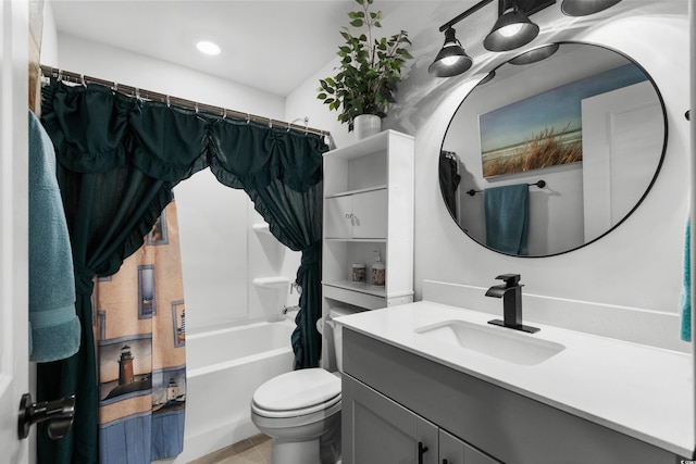 full bathroom with tile patterned floors, toilet, vanity, and shower / bath combination with curtain