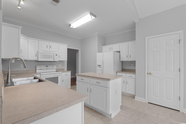 kitchen with visible vents, a sink, white appliances, light countertops, and light floors