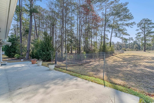 view of yard featuring a patio and fence