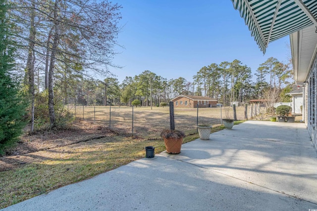 view of yard with a patio and fence