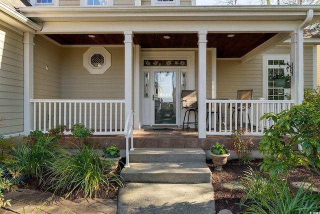 entrance to property with a porch