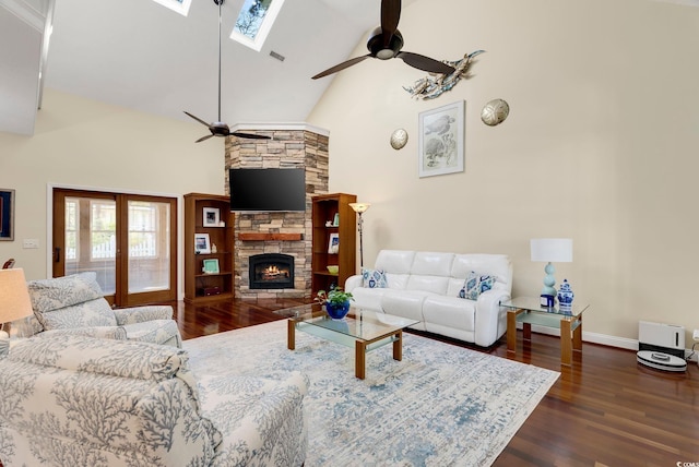 living room featuring dark wood-style floors, high vaulted ceiling, and a ceiling fan