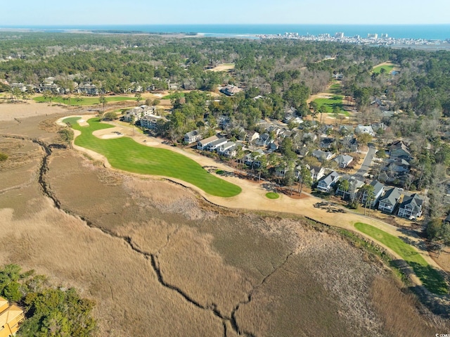 aerial view featuring a water view and view of golf course