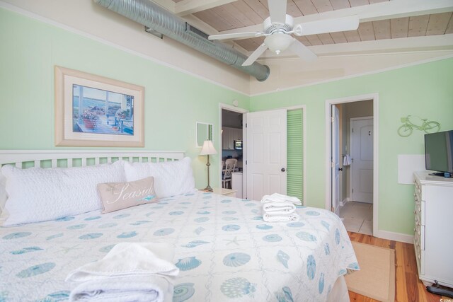 162 Norris Dr, Pawleys Island, SC 29585 - bedroom featuring a ceiling fan, light wood finished floors, baseboards, wood ceiling, and vaulted ceiling with beams