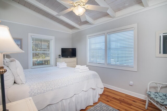 162 Norris Dr, Pawleys Island, SC 29585 - bedroom featuring a ceiling fan, light wood-style floors, baseboards, wood ceiling, and vaulted ceiling with beams
