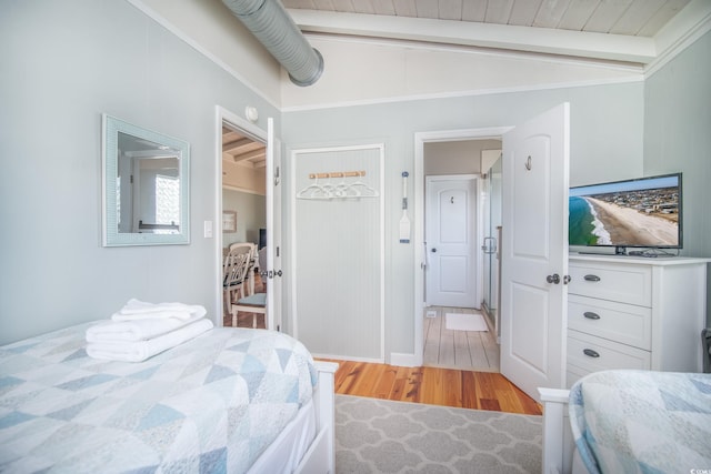 162 Norris Dr, Pawleys Island, SC 29585 - bedroom featuring vaulted ceiling with beams, wood ceiling, and light wood-type flooring