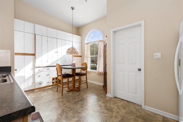 dining space with baseboards