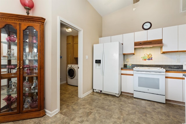 kitchen featuring white appliances, washer / clothes dryer, white cabinets, under cabinet range hood, and backsplash