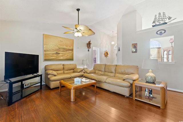 living room with lofted ceiling, a ceiling fan, and wood finished floors