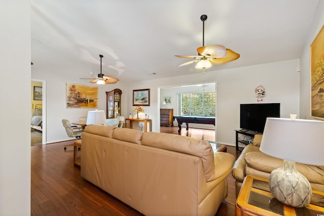 living area featuring billiards, dark wood-style floors, a ceiling fan, and baseboards