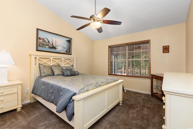 bedroom featuring vaulted ceiling, baseboards, dark carpet, and ceiling fan