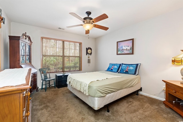 bedroom featuring visible vents, ceiling fan, baseboards, and carpet floors