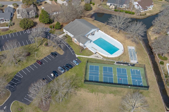 bird's eye view with a residential view and a water view