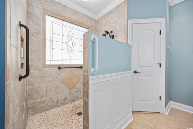 full bath with tile patterned floors, walk in shower, baseboards, and ornamental molding