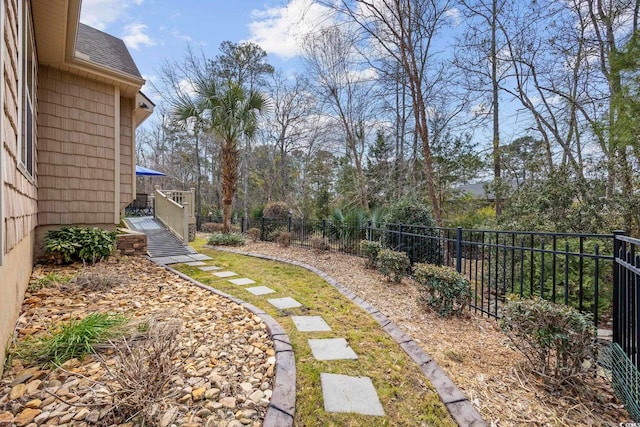 view of yard featuring fence