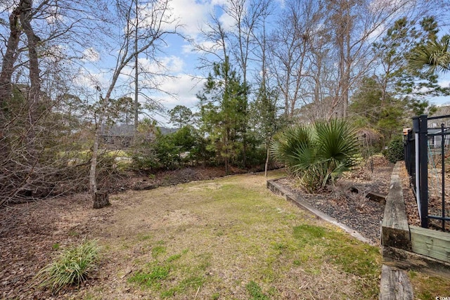 view of yard featuring fence