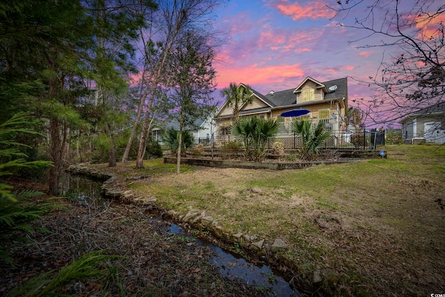 exterior space featuring a lawn