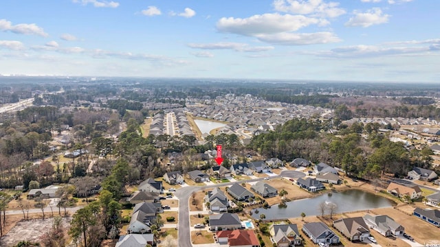 aerial view with a residential view and a water view