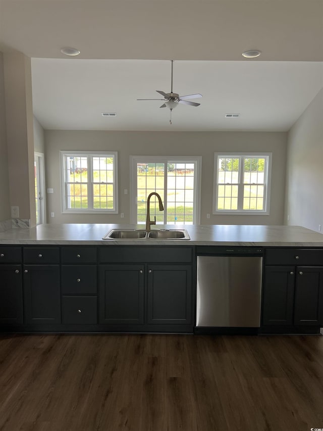 kitchen with ceiling fan, a sink, dishwasher, dark wood finished floors, and visible vents