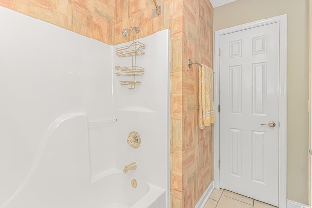 full bath featuring tile patterned floors and  shower combination