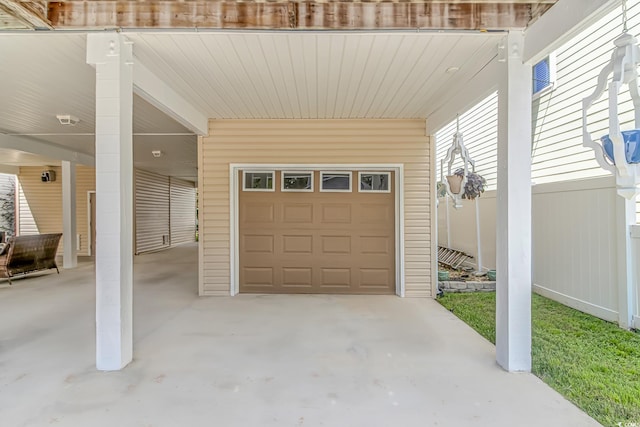 garage featuring a carport