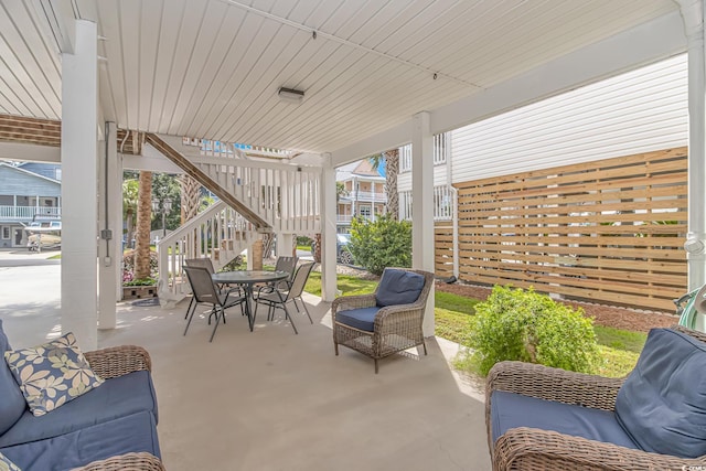 view of patio / terrace with stairs and outdoor dining area