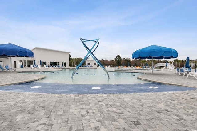 community pool with a patio