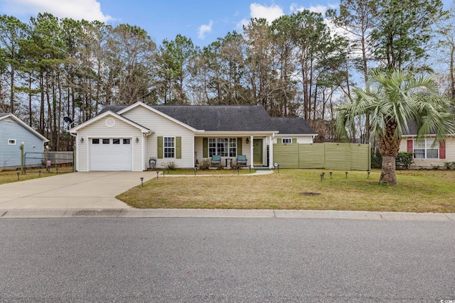 ranch-style house with a front yard, driveway, fence, and an attached garage