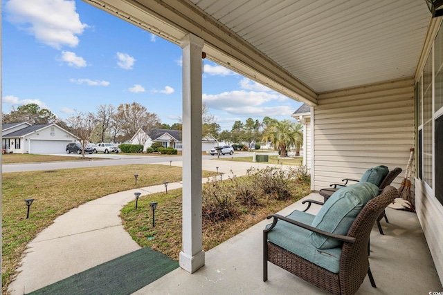 view of patio / terrace featuring a residential view and a porch