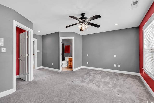 unfurnished bedroom featuring baseboards, visible vents, recessed lighting, and light colored carpet