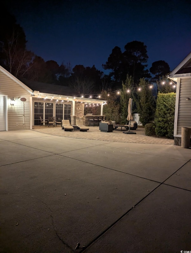 exterior space with an outdoor living space and a patio area