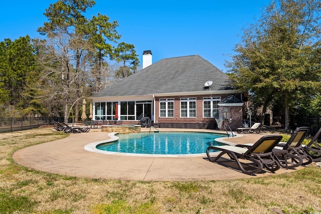 view of pool featuring a fenced in pool, a patio area, fence, and a sunroom