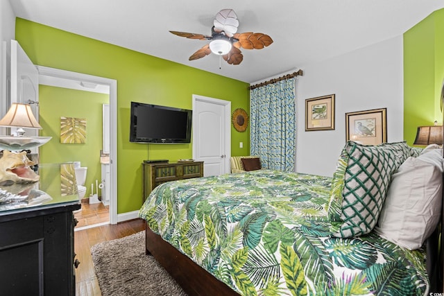 100 N Beach Blvd Unit 1608, North Myrtle Beach, SC 29582 - bedroom with wood finished floors, connected bathroom, and a ceiling fan