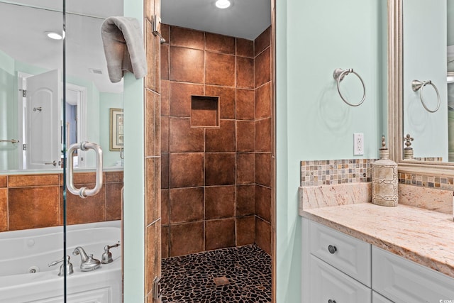 100 N Beach Blvd Unit 1608, North Myrtle Beach, SC 29582 - full bathroom with a tile shower, a whirlpool tub, vanity, and backsplash