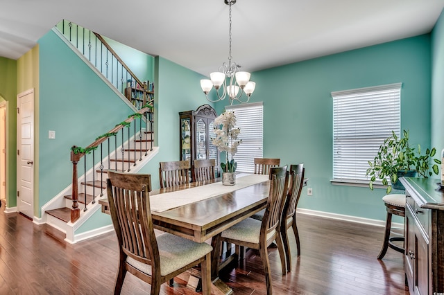 dining space with stairway, baseboards, a notable chandelier, and dark wood-style floors