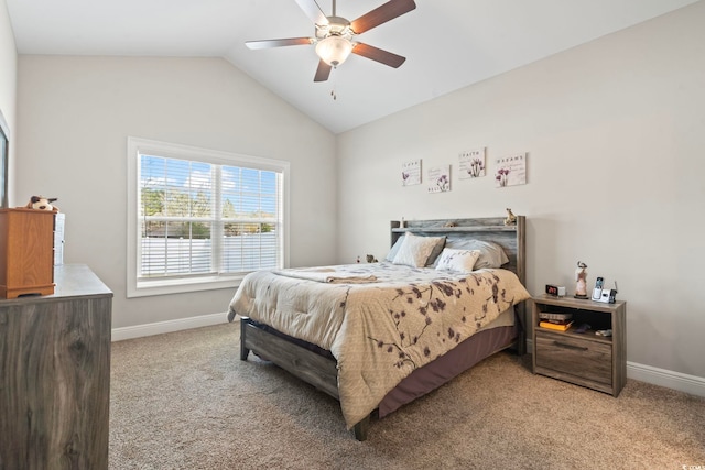 bedroom with light carpet, baseboards, and lofted ceiling