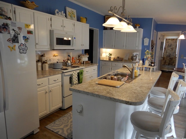 2516 Stones Edge Blvd, Little River, SC 29566 - kitchen featuring white appliances, white cabinets, a sink, light countertops, and ornamental molding