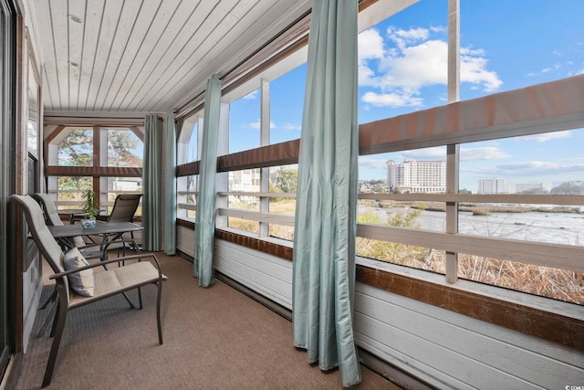501 Maison Dr Unit F-1, Myrtle Beach, SC 29572 - sunroom / solarium featuring carpet flooring, a view of city, and wood ceiling