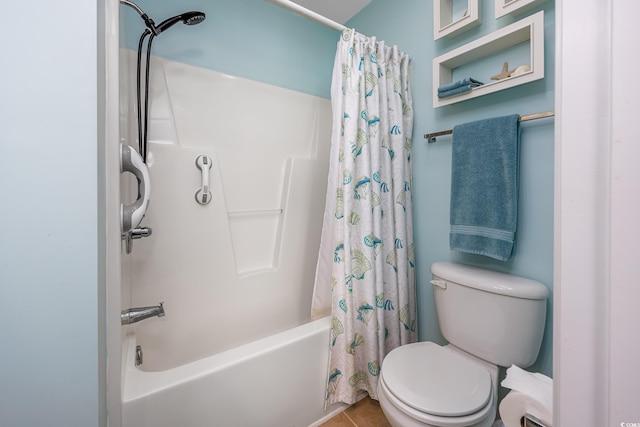 bathroom with toilet, shower / tub combo, and tile patterned flooring