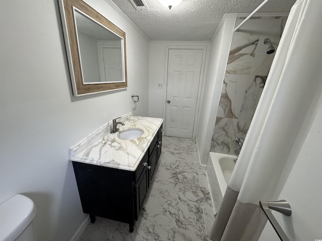 full bathroom with shower / tub combo, vanity, a textured ceiling, toilet, and marble finish floor