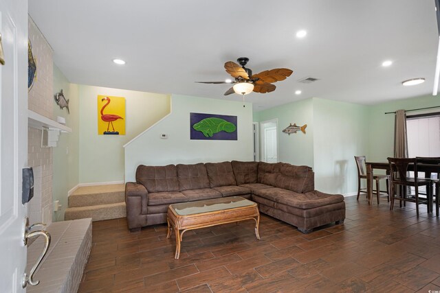 508-B Rosemary Ln, North Myrtle Beach, SC 29582 - living room featuring dark wood-style flooring, a ceiling fan, baseboards, recessed lighting, and a fireplace
