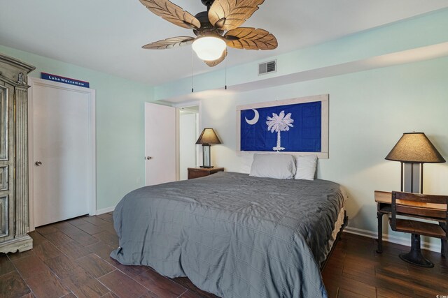 508-B Rosemary Ln, North Myrtle Beach, SC 29582 - bedroom featuring wood finished floors, baseboards, and ceiling fan