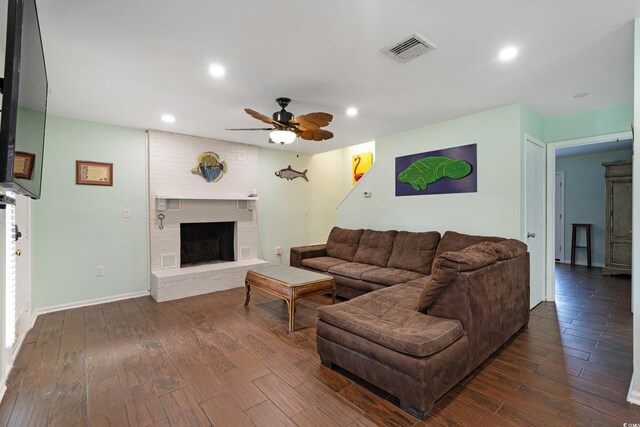508-B Rosemary Ln, North Myrtle Beach, SC 29582 - living area with dark wood-style floors, a ceiling fan, recessed lighting, a fireplace, and baseboards