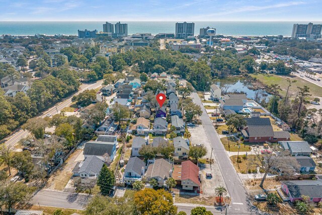 508-B Rosemary Ln, North Myrtle Beach, SC 29582 - aerial view of property and surrounding area featuring a large body of water, nearby urban area, and nearby suburban area