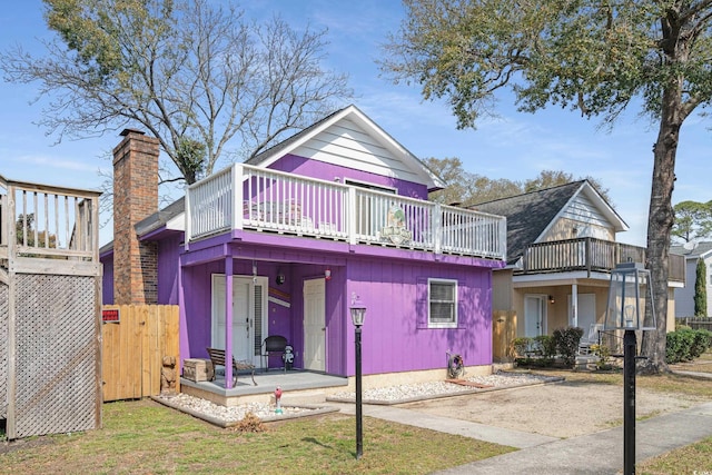 508-B Rosemary Ln, North Myrtle Beach, SC 29582 - rear view of house with a chimney